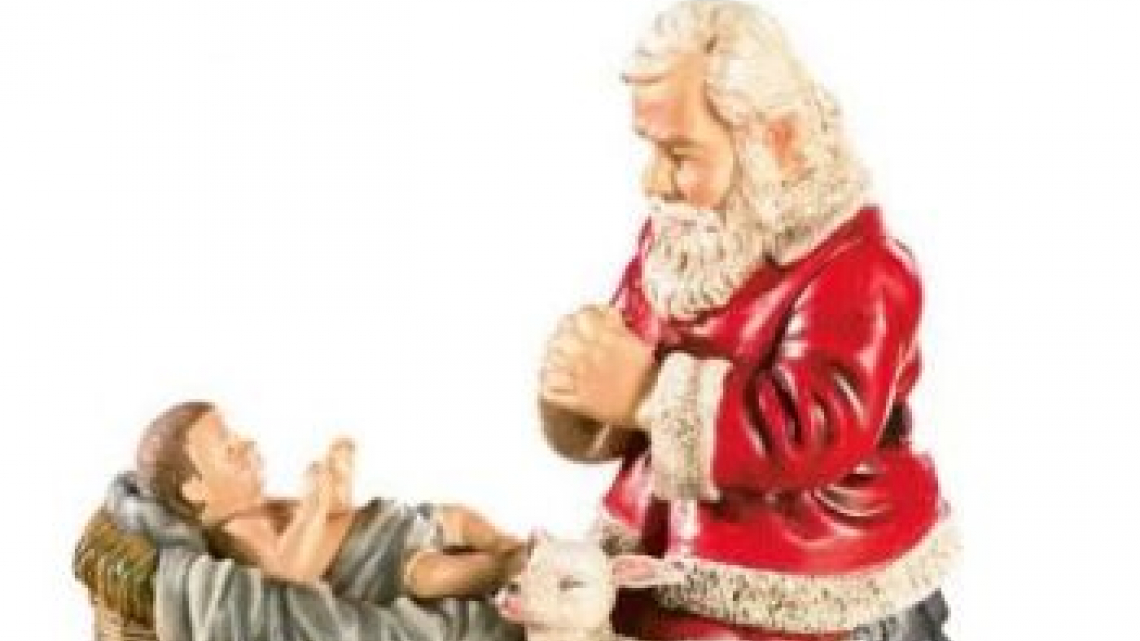 Santa in manger